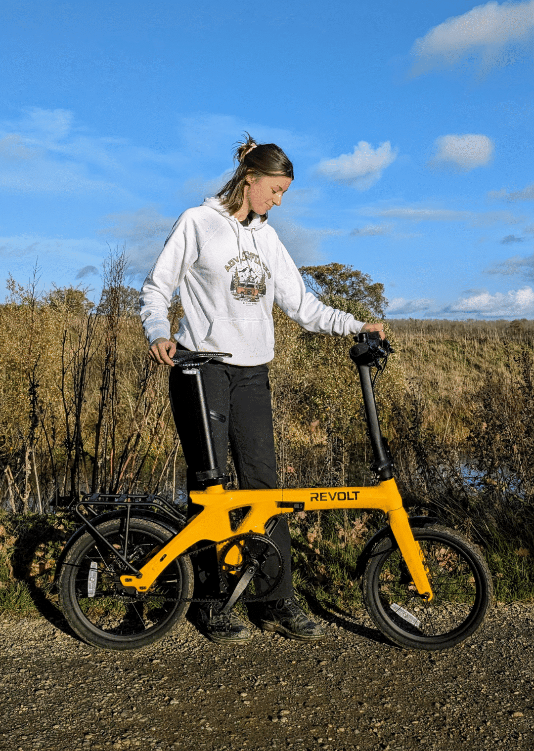 Unfolding Adventures Eco Hoodie White Female, Revolt Carbon Fiber Pro V3 E-Bike Yellow