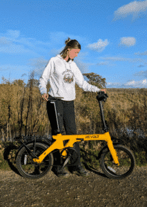 Unfolding Adventures Eco Hoodie White Female, Revolt Carbon Fiber Pro V3 E-Bike Yellow