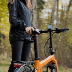 Revolt Carbon Fiber Pro V2 Chain Drive E-Bike, Rear Suspension, Pale Orange, Female