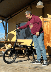 Revolt Carbon Fiber Pro V3, Mid Motor, Belt Drive E-Bike, Black, Male, Unfolding Adventures Hoodie Bordeaux