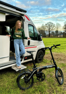 Revolt Carbon Fiber Pro V3, Mid Motor, Belt Drive E-Bike, Black, Female, Trailblazer Sweater Green, Camper, Camping
