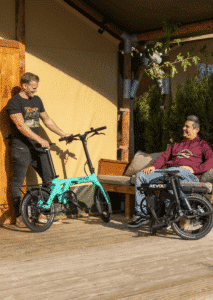 Revolt Carbon Fiber Pro V3, Mid Motor, Belt Drive E-Bike, Black, Mint Green, Male, Unfolding Adventures Hoodie Bordeaux, Trailblazer T-Shirt Black