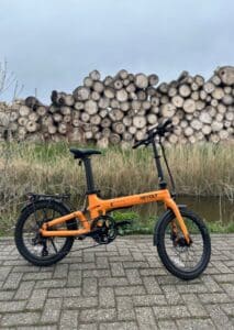 Revolt Carbon Fiber Pro V2 E-Bike, Chain Drive, Rear Suspension, Pale Orange